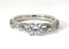 Round Cut Diamond Infinity Band with Diamond Clusters